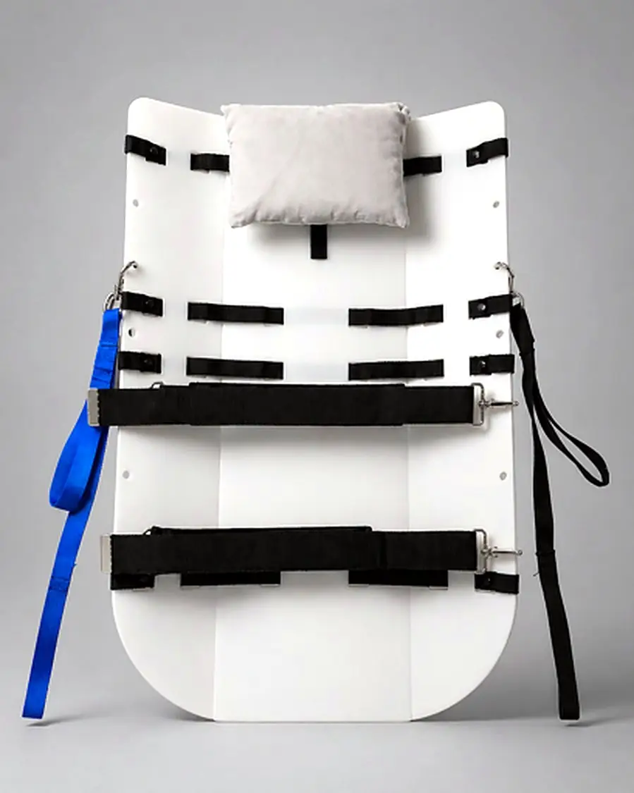 Elevon Patient Mobility Board prototype with securing straps, lift straps, and head pillow